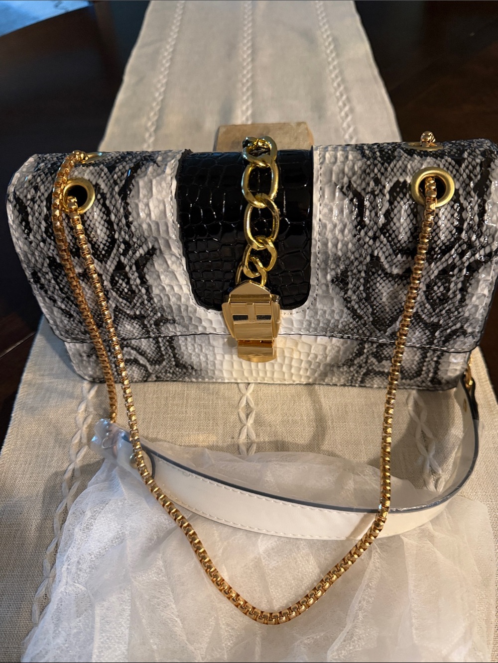 Snake-Embossed Black & White Crossbody Bag with Gold Chain